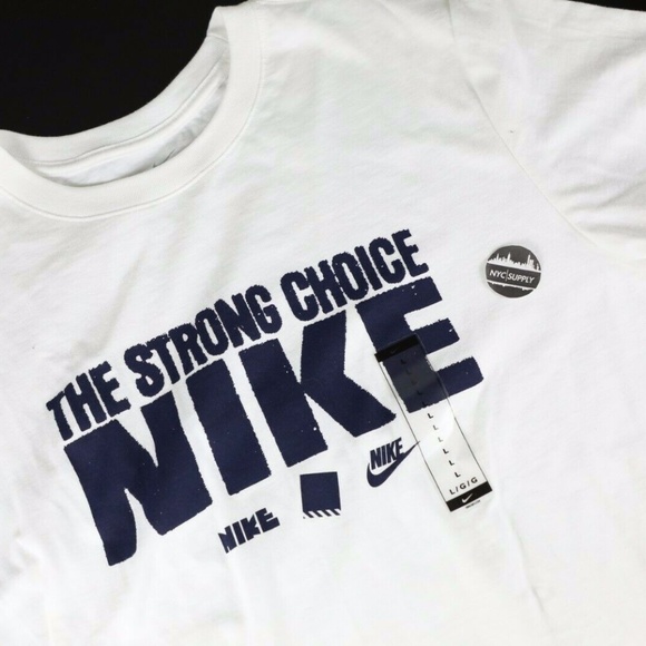 white and navy nike shirt